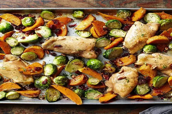 Maple Roasted Chicken Thighs with Sweet Potato Wedges and Brussels